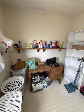 a room with toys and dresser