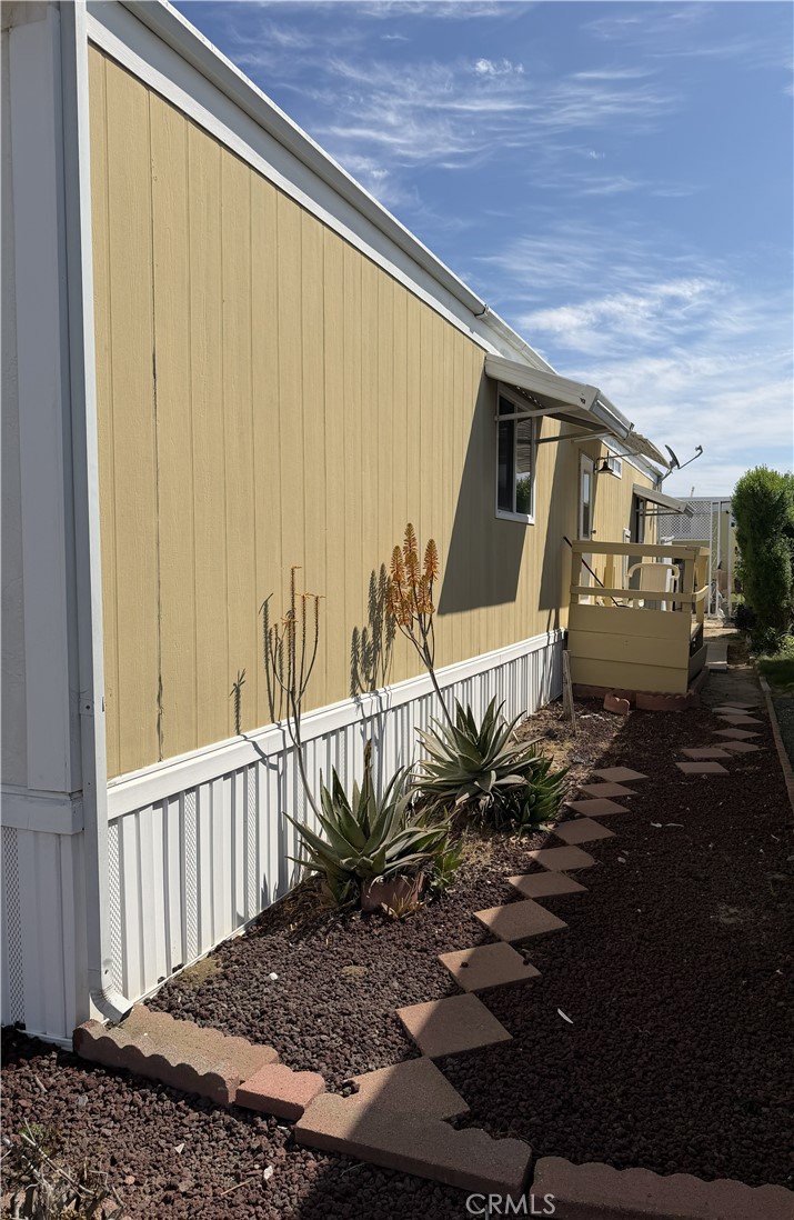 3700 Olds Road, Unit 38 Oxnard, CA 93033 - Photo 23 of 26 Side access to the home.