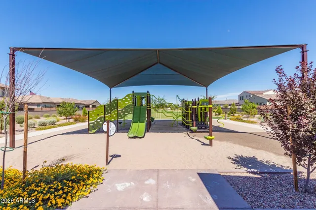 a view of a street with an outdoor seating
