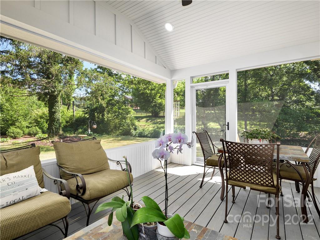 1 Inglewood Road Asheville, NC 28804 - Photo 18 of 40 a outdoor living space with furniture and garden view