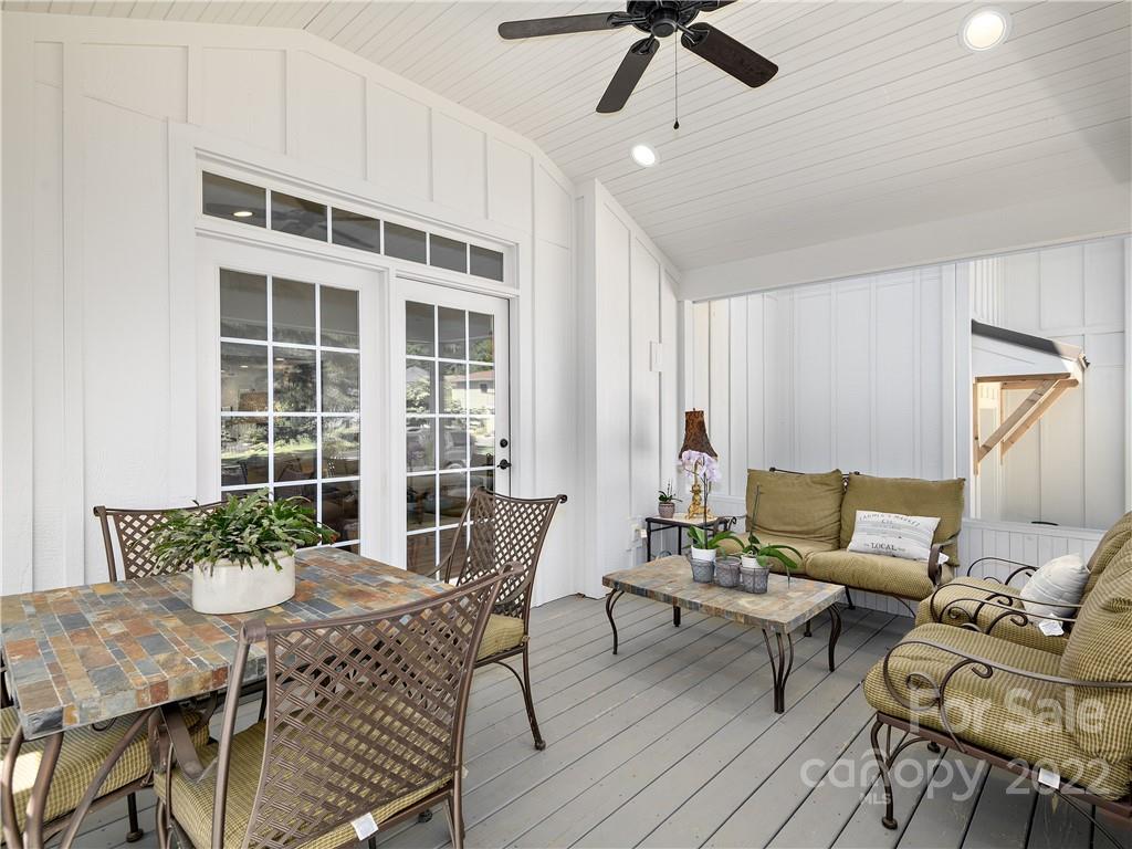 1 Inglewood Road Asheville, NC 28804 - Photo 19 of 40 a living room with furniture and a large window