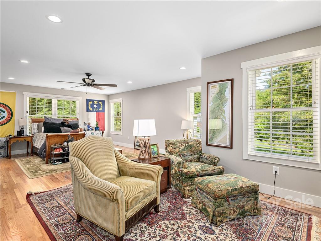 1 Inglewood Road Asheville, NC 28804 - Photo 24 of 40 a living room with furniture and a window
