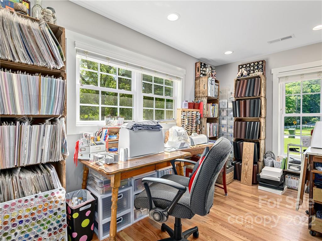 1 Inglewood Road Asheville, NC 28804 - Photo 28 of 40 a work room with furniture and a floor to ceiling window