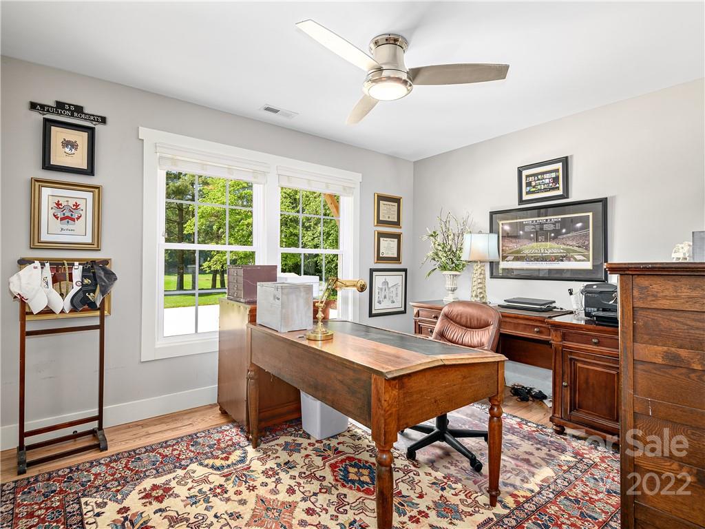 1 Inglewood Road Asheville, NC 28804 - Photo 32 of 40 a view of a workspace with furniture and a window