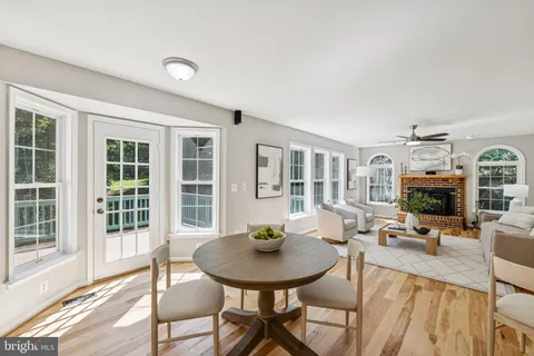 a view of a livingroom with furniture and a fireplace