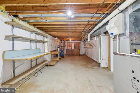 a view of an empty room with washing machine