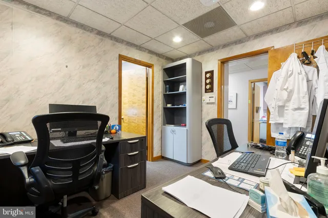 a workspace with furniture and window