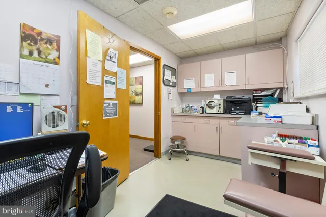 a view of a room with furniture