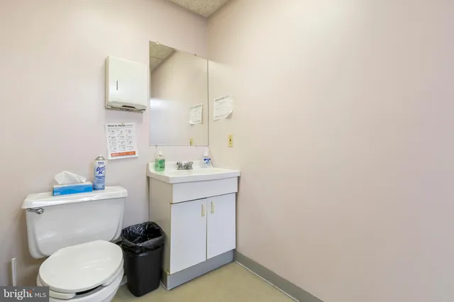 a kitchen with refrigerator and window