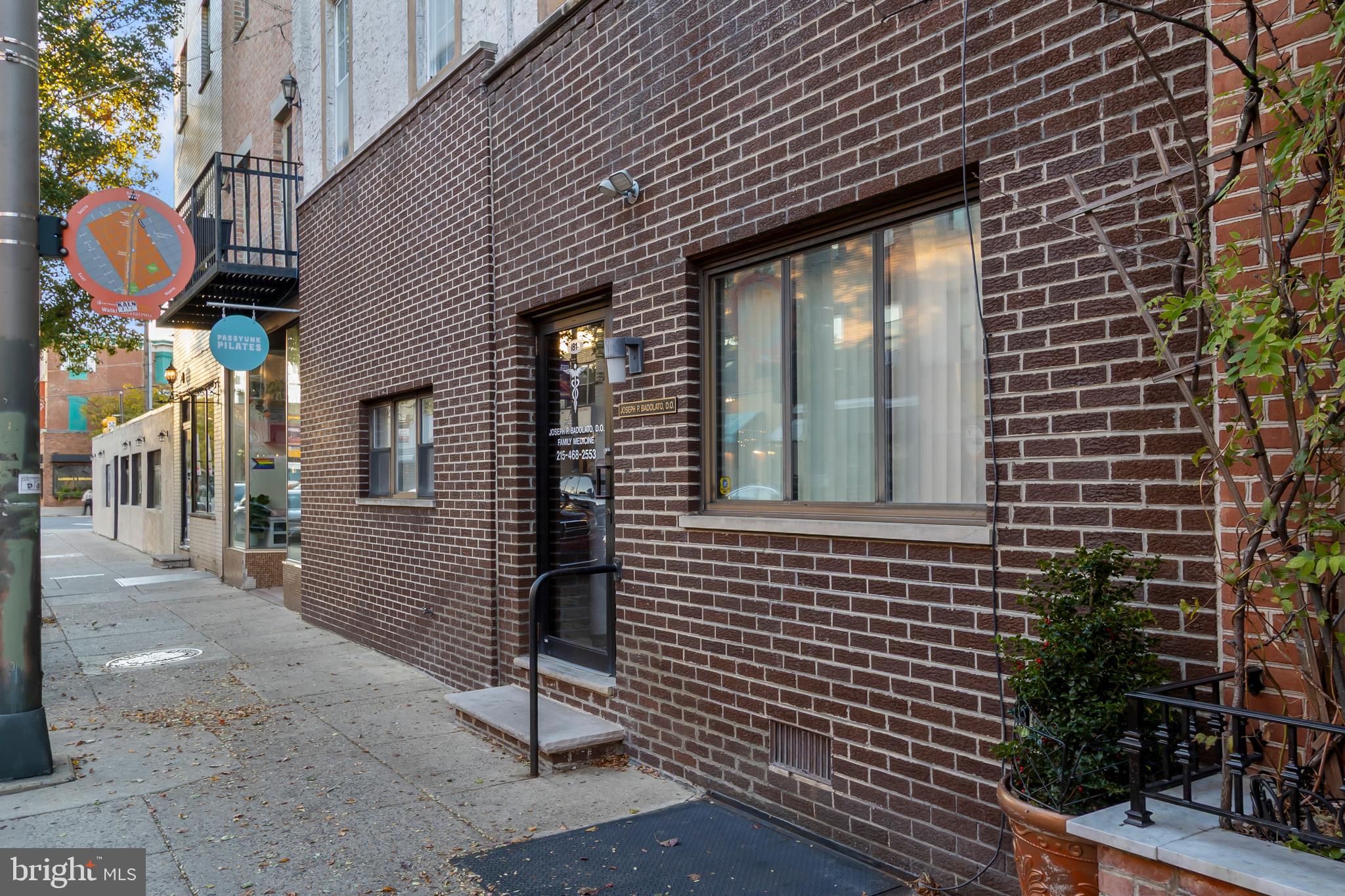 1816-18 East Passyunk Avenue Philadelphia, PA 19148 - Photo 5 of 58 a view of brick house with a large windows