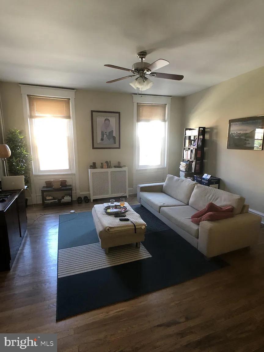 1816-18 East Passyunk Avenue Philadelphia, PA 19148 - Photo 57 of 58 a living room with furniture and a wooden floor