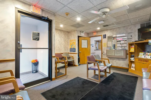 a view of a livingroom with furniture and a livingroom