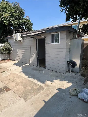 a view of a backyard of a house