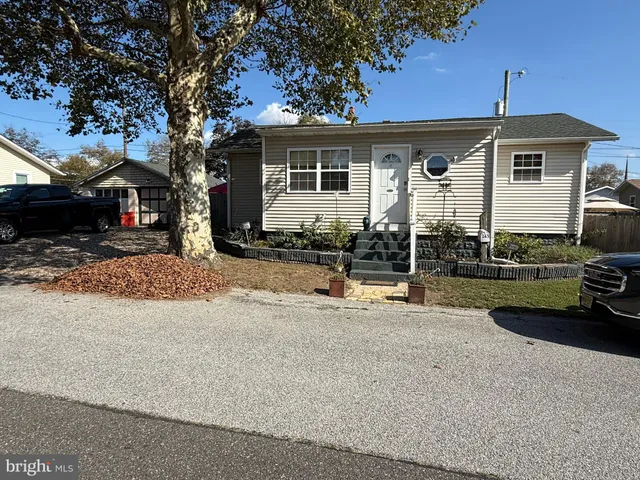 a front view of a house with a patio