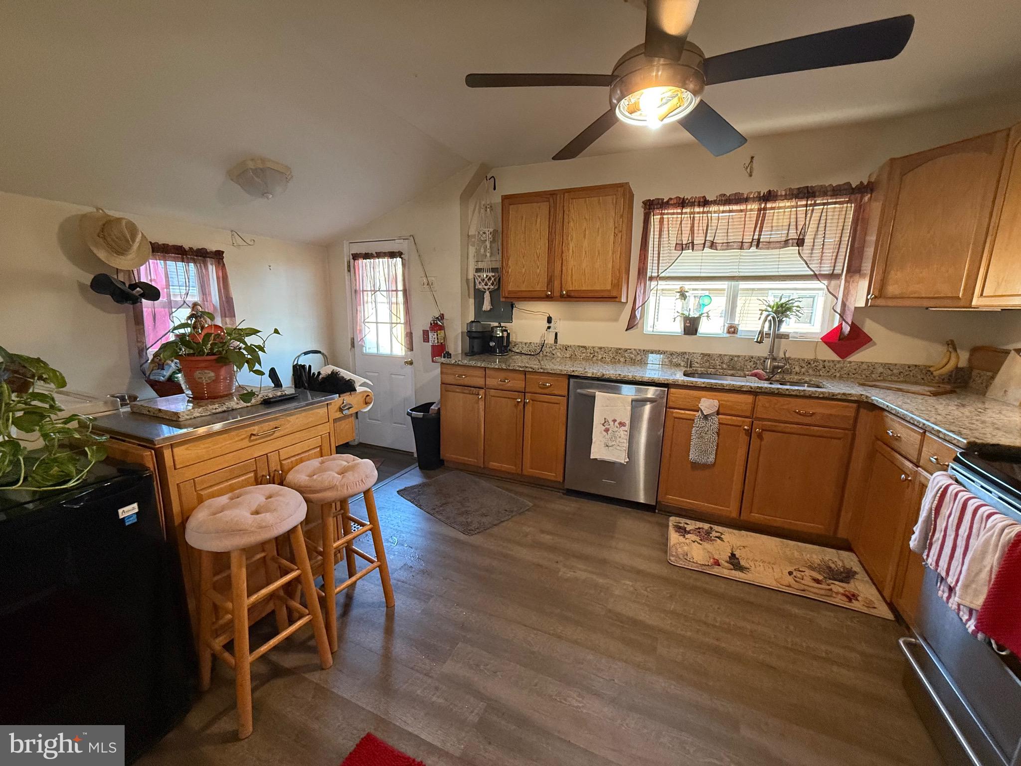 243 C Street Carneys Point, NJ 08069 - Photo 11 of 21 a kitchen with granite countertop lots of counter top space and dining table
