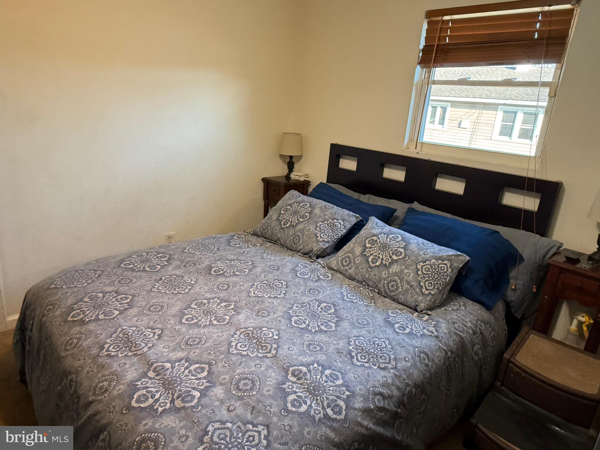 243 C Street Carneys Point, NJ 08069 - Photo 19 of 21 a bedroom with a bed and a window