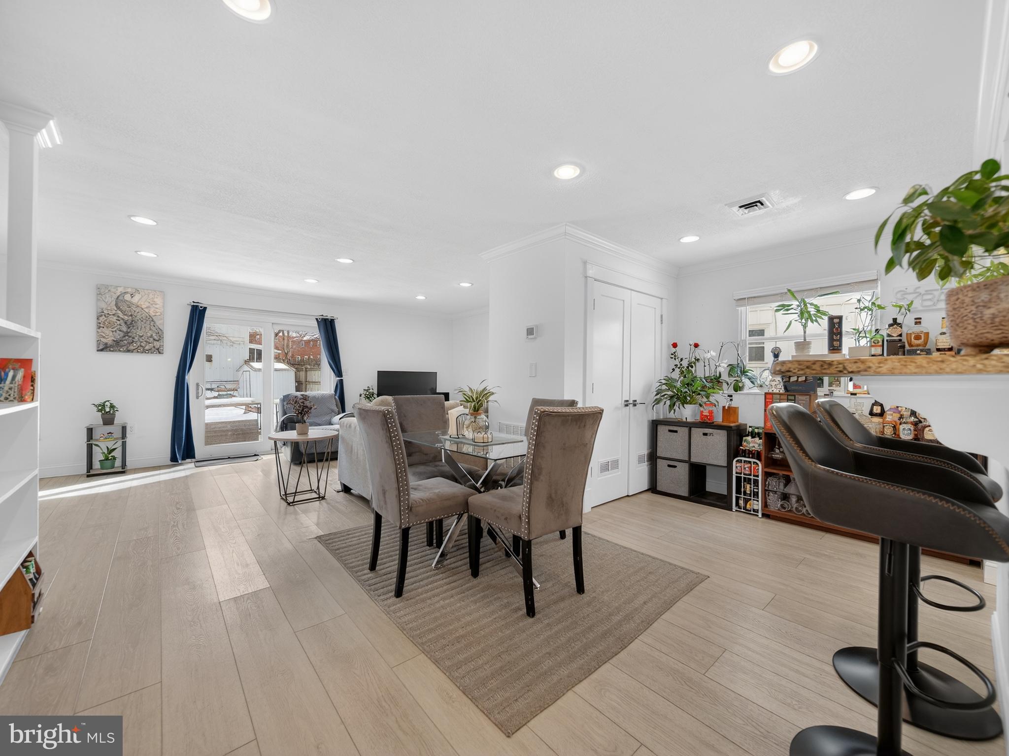609 Cedarleaf Avenue Capitol Heights, MD 20743 - Photo 14 of 42 a living room with lots of furniture and view of kitchen