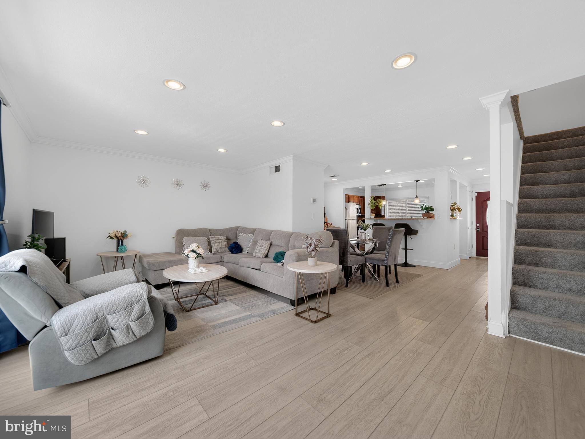 609 Cedarleaf Avenue Capitol Heights, MD 20743 - Photo 18 of 42 a living room with furniture and wooden floor