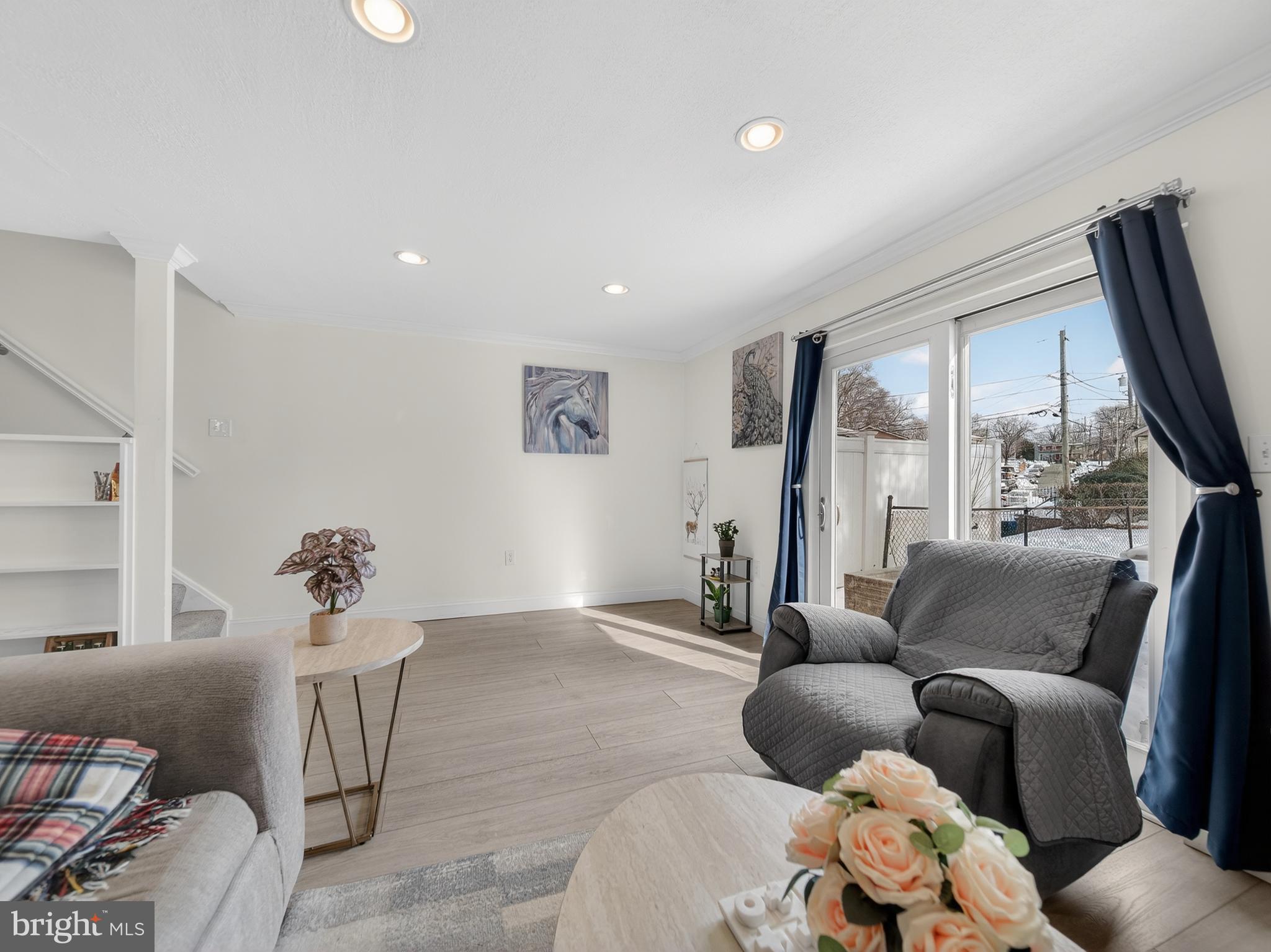 609 Cedarleaf Avenue Capitol Heights, MD 20743 - Photo 22 of 42 a living room with furniture and a large window