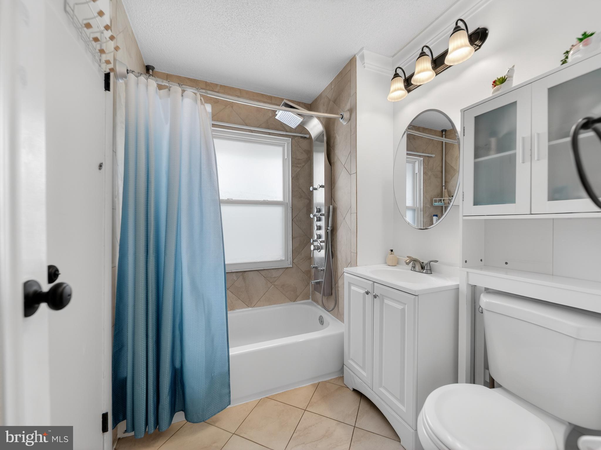 609 Cedarleaf Avenue Capitol Heights, MD 20743 - Photo 26 of 42 a bathroom with a sink toilet and shower