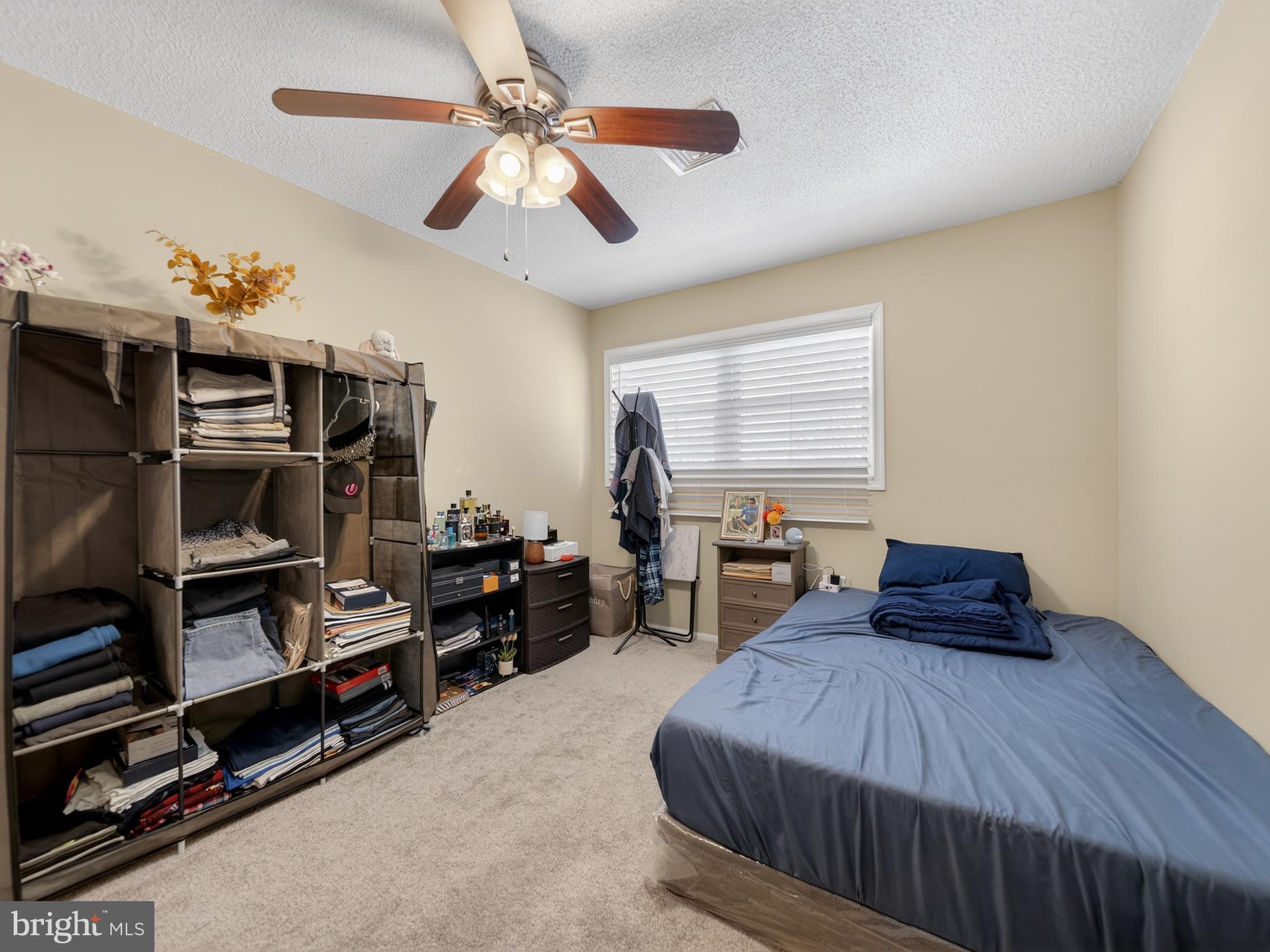 609 Cedarleaf Avenue Capitol Heights, MD 20743 - Photo 36 of 42 a bedroom with furniture and window
