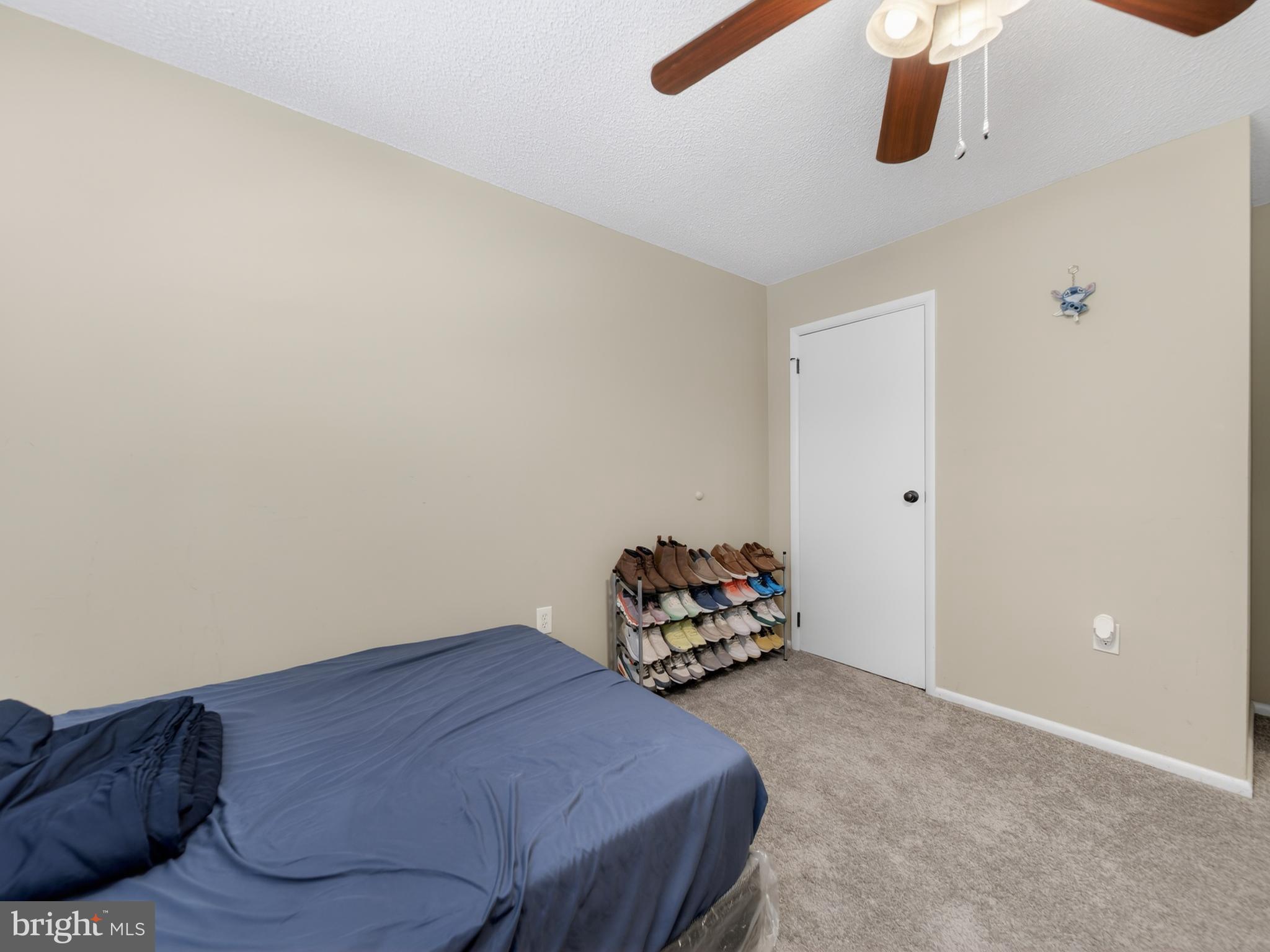 609 Cedarleaf Avenue Capitol Heights, MD 20743 - Photo 37 of 42 a bedroom with a bed and cabinets