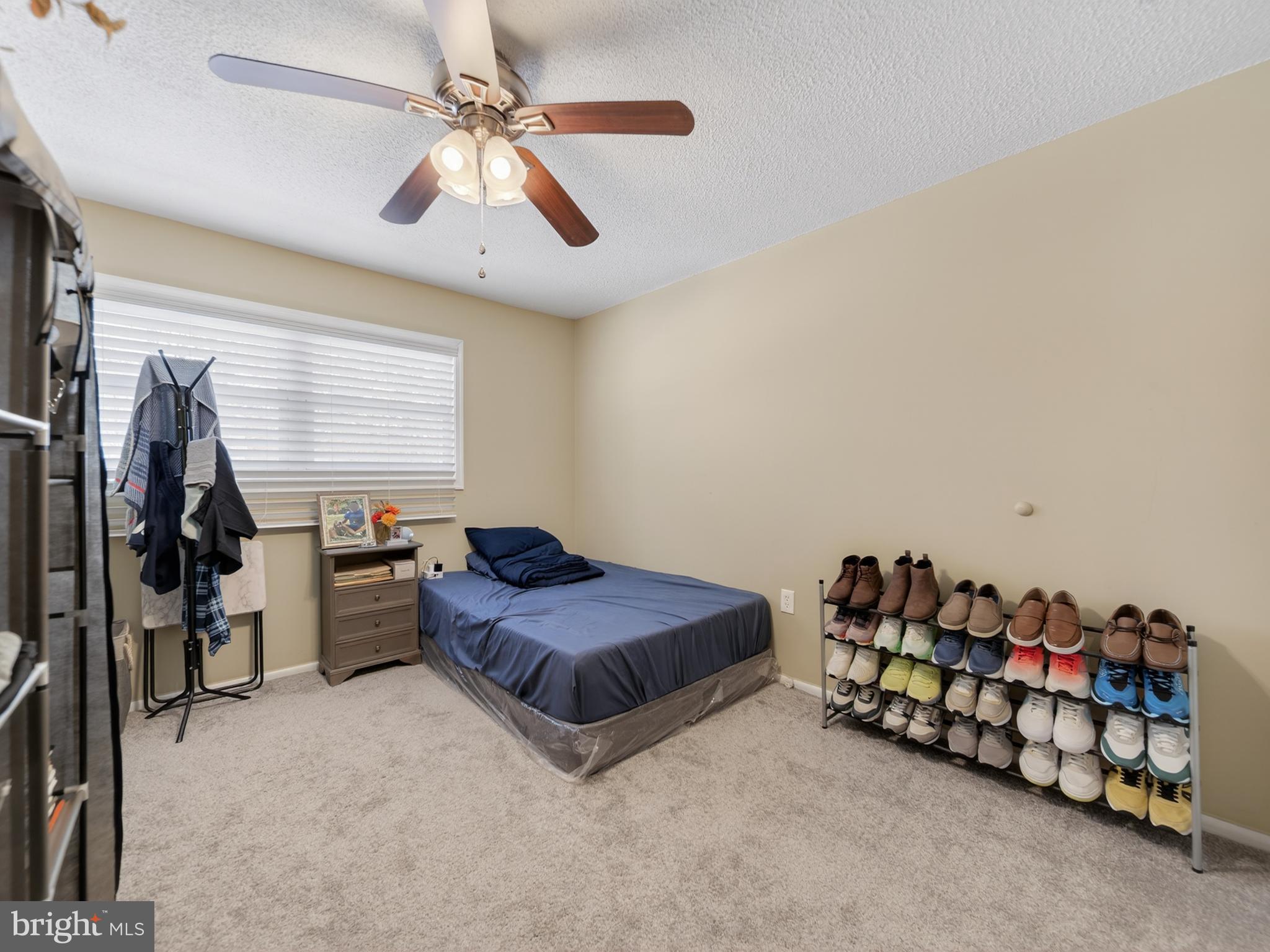 609 Cedarleaf Avenue Capitol Heights, MD 20743 - Photo 38 of 42 a bedroom with furniture and a window