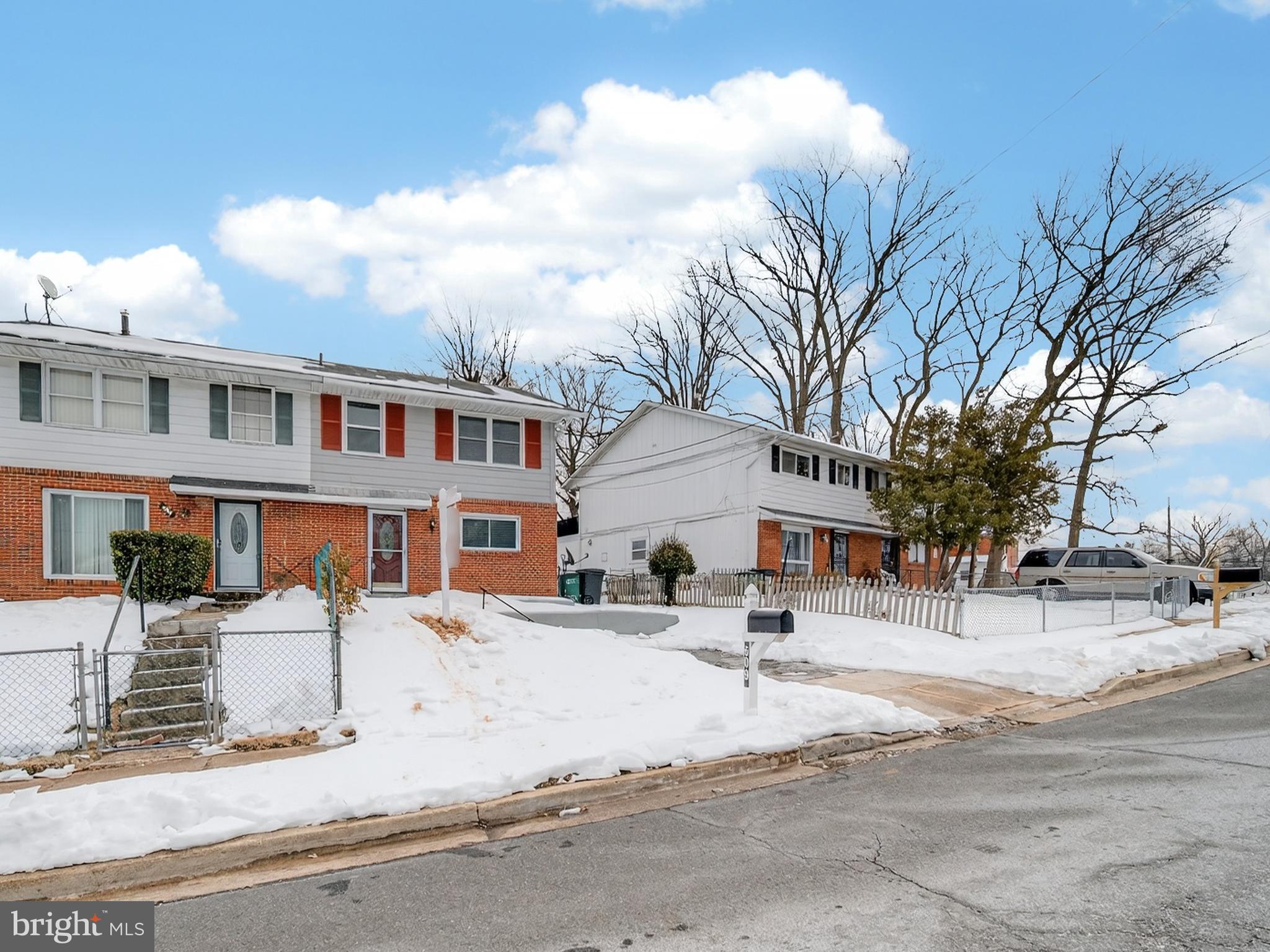 609 Cedarleaf Avenue Capitol Heights, MD 20743 - Photo 5 of 42 a street view with residential house