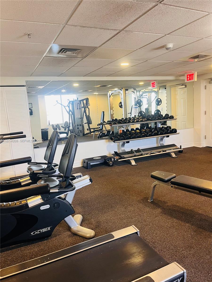 900 Southwest 8th Street, Unit 806 Miami, FL 33130 - Photo 15 of 22 a room with lots of gym equipment