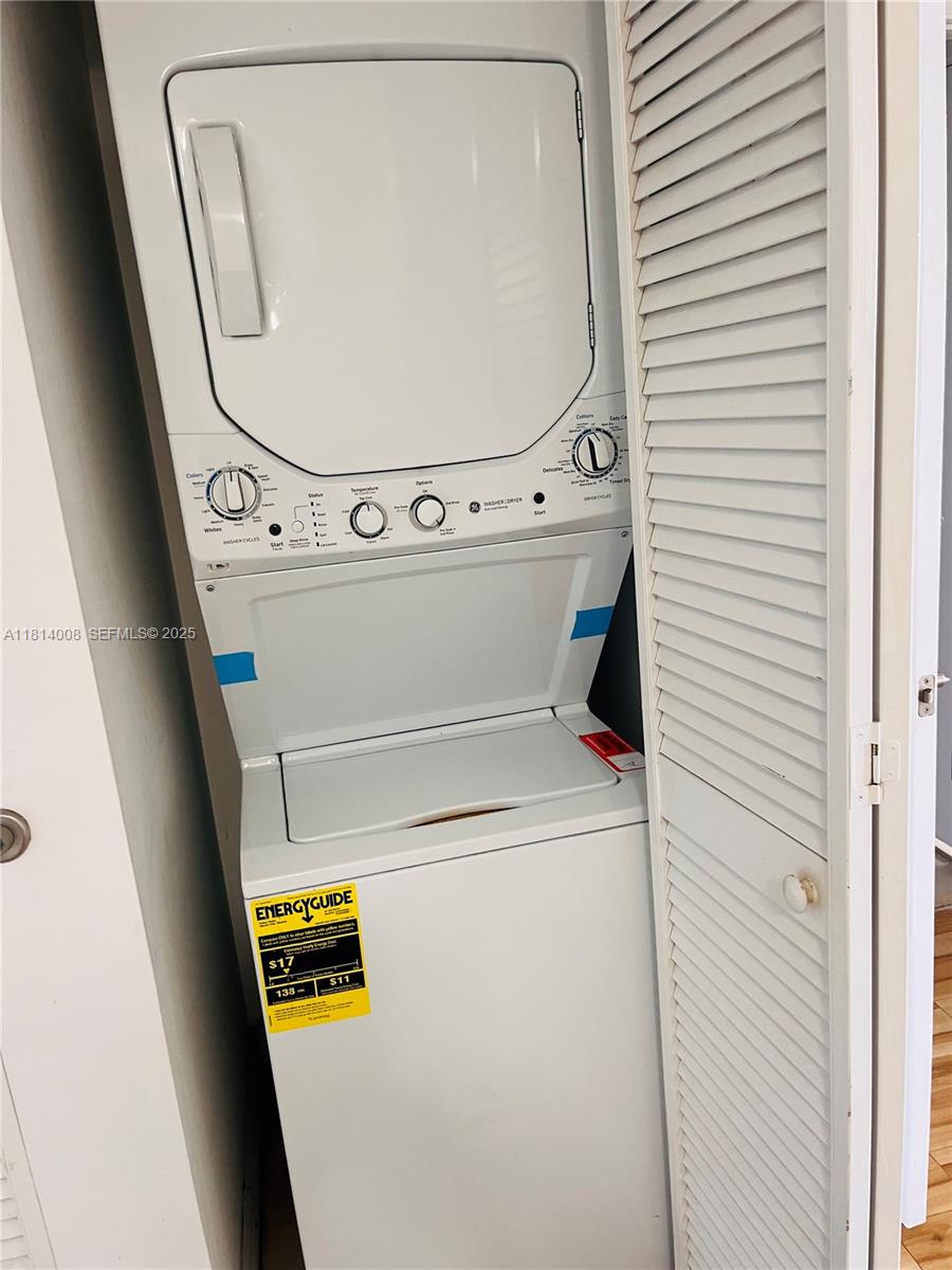 900 Southwest 8th Street, Unit 806 Miami, FL 33130 - Photo 3 of 22 a utility room with dryer and washer