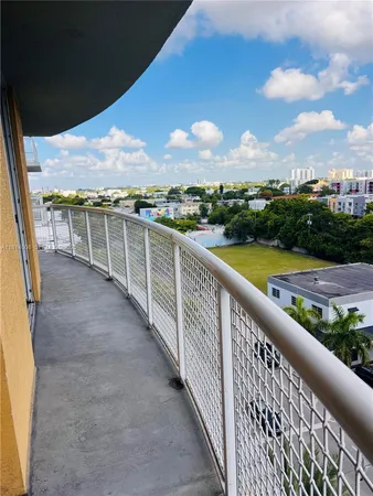a view of a balcony with city view