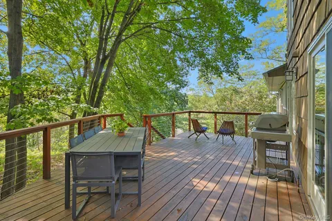 a view of balcony deck and outdoor seating