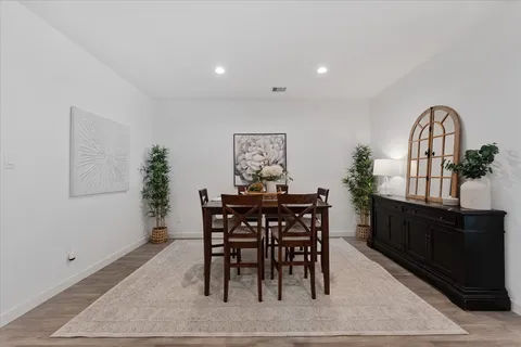 a view of a dining room with furniture
