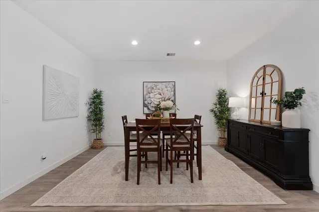 a view of a dining room with furniture