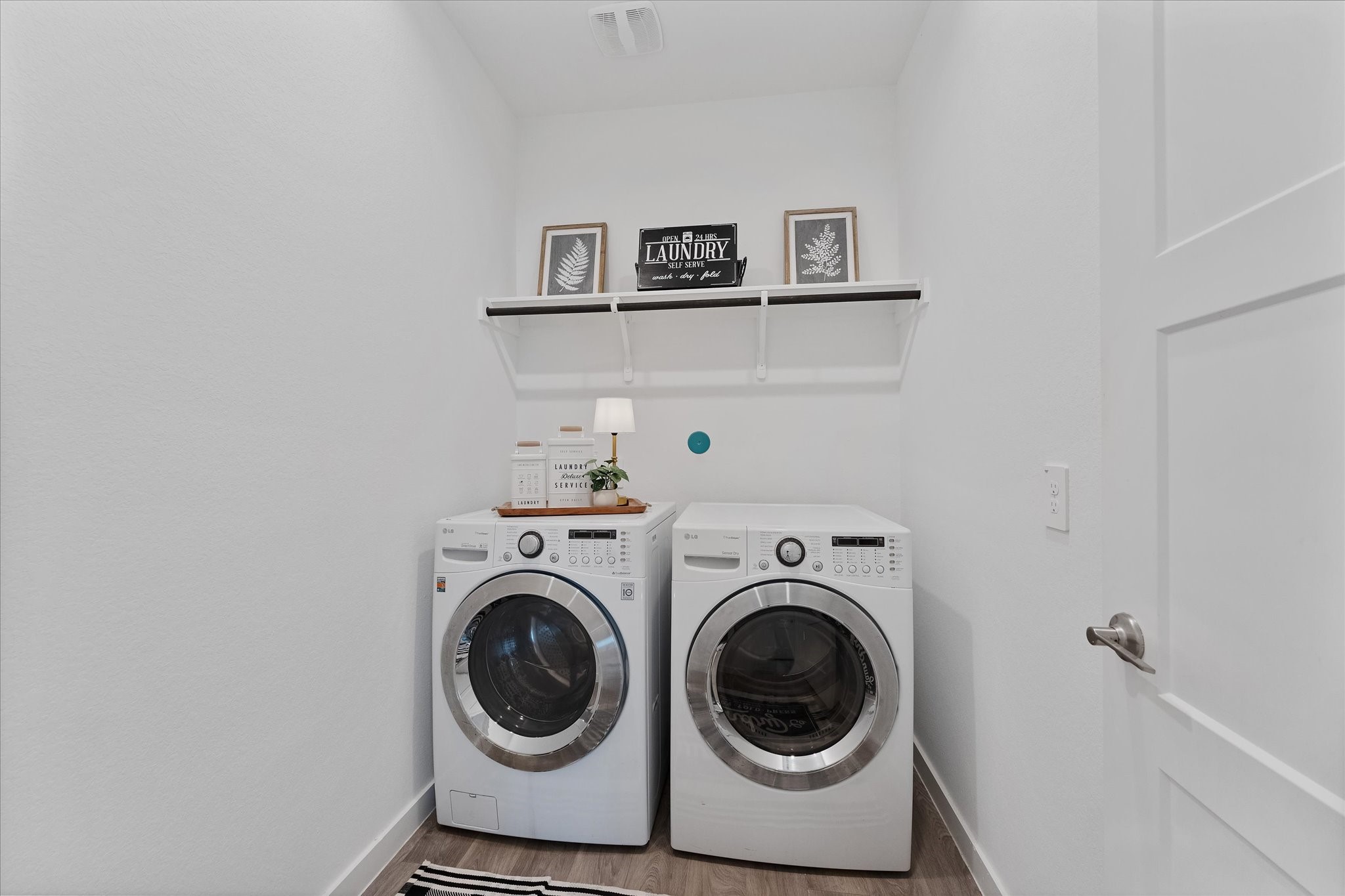 10426 Plateau Pt Trail Conroe, TX 77384 - Photo 30 of 50 a utility room with dryer and washer