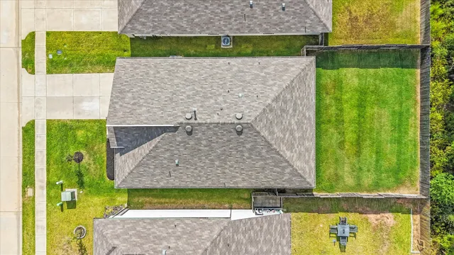 a aerial view of a house with a garden