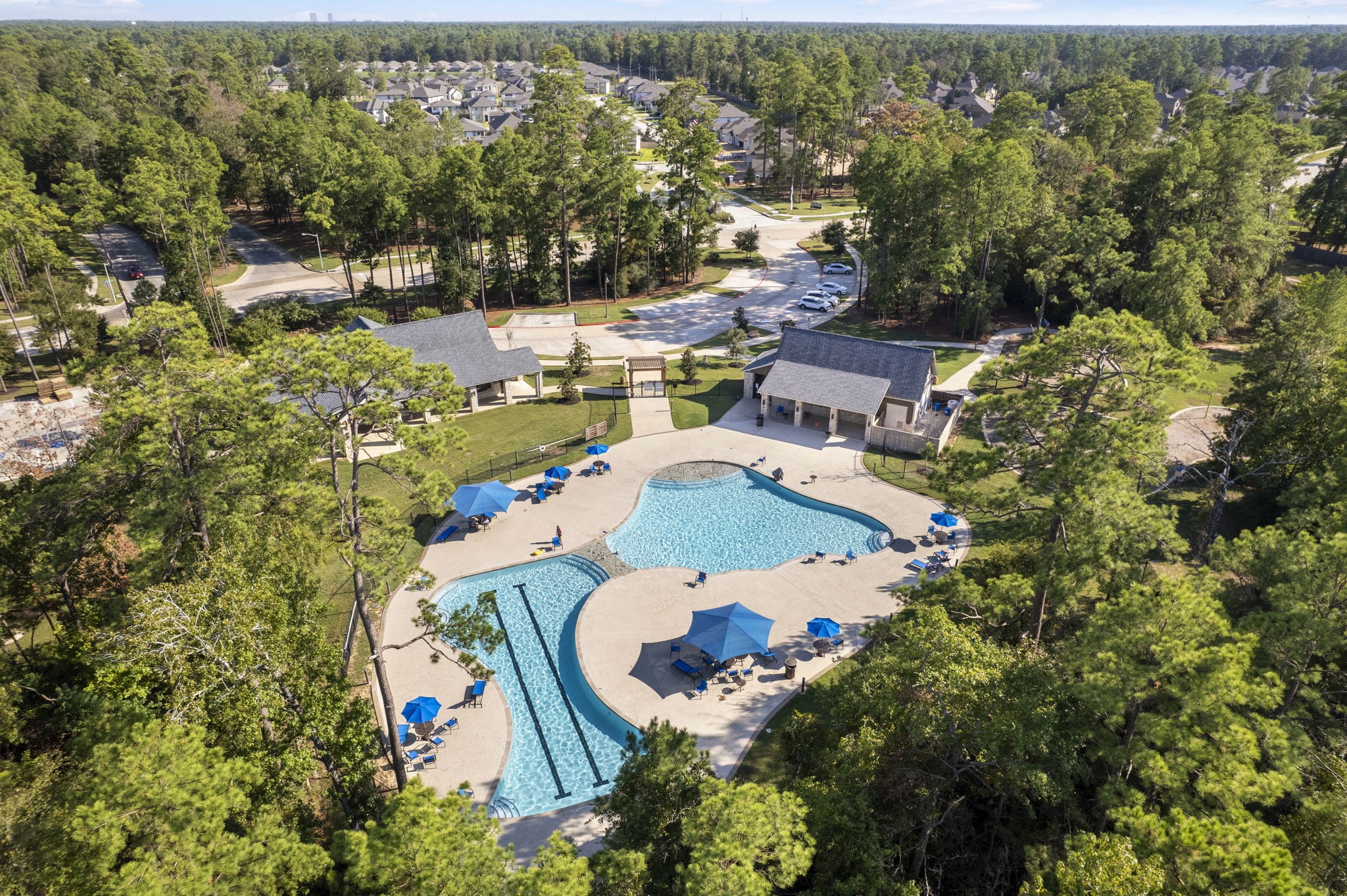 10426 Plateau Pt Trail Conroe, TX 77384 - Photo 47 of 50 an aerial view of residential houses with outdoor space