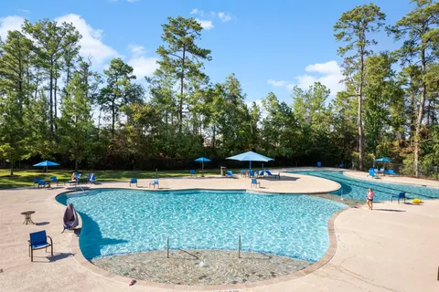 swimming pool with outdoor seating