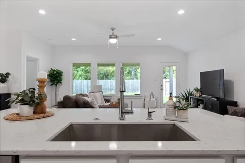 a view of living room with furniture and flat screen tv