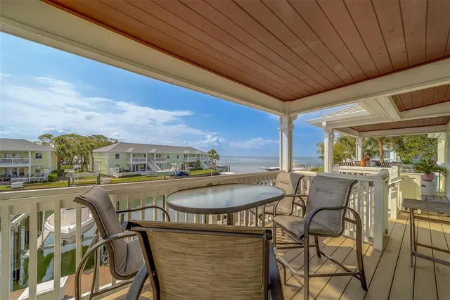 a view of a patio with swimming pool