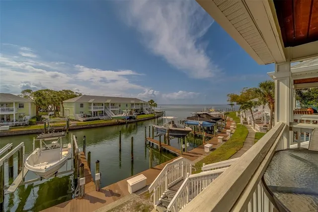 a view of a balcony with chairs