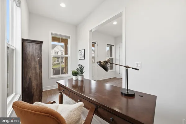 a view of a livingroom with furniture and window