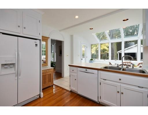 642 Worcester Street Wellesley, MA 02482 - Photo 11 of 23 a kitchen with stainless steel appliances a refrigerator sink and cabinets