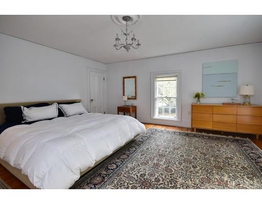 642 Worcester Street Wellesley, MA 02482 - Photo 15 of 23 a bedroom with a bed and window