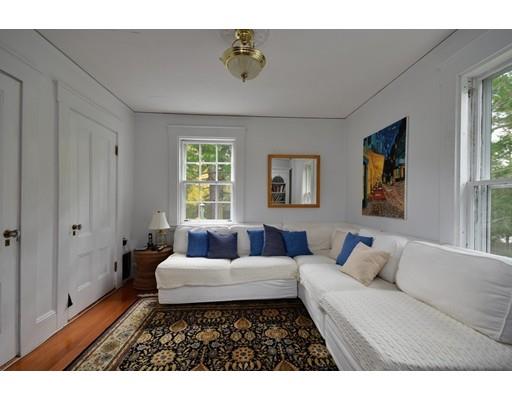 642 Worcester Street Wellesley, MA 02482 - Photo 18 of 23 a living room with furniture and a window