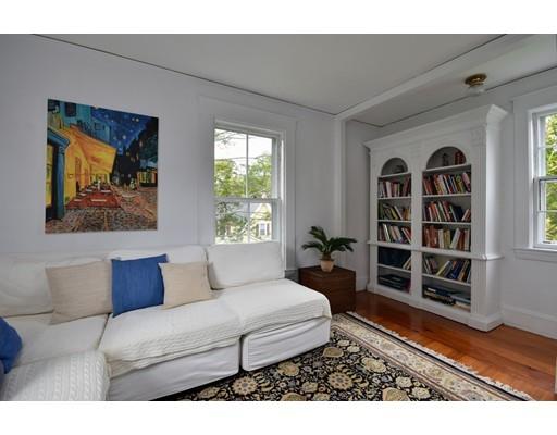 642 Worcester Street Wellesley, MA 02482 - Photo 19 of 23 a living room with furniture and a book shelf