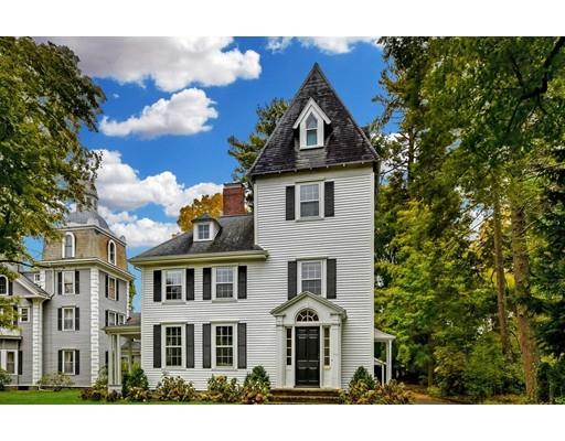 642 Worcester Street Wellesley, MA 02482 - Photo 2 of 23 a front view of a house with a yard