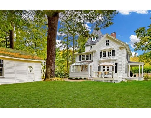 642 Worcester Street Wellesley, MA 02482 - Photo 21 of 23 a front view of a house with garden