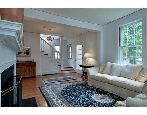 642 Worcester Street Wellesley, MA 02482 - Photo 4 of 23 a living room with furniture and a fireplace