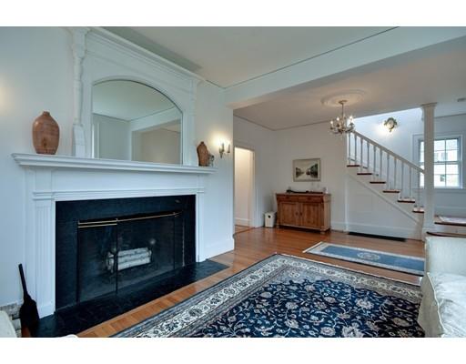 642 Worcester Street Wellesley, MA 02482 - Photo 5 of 23 a living room with furniture and a fireplace